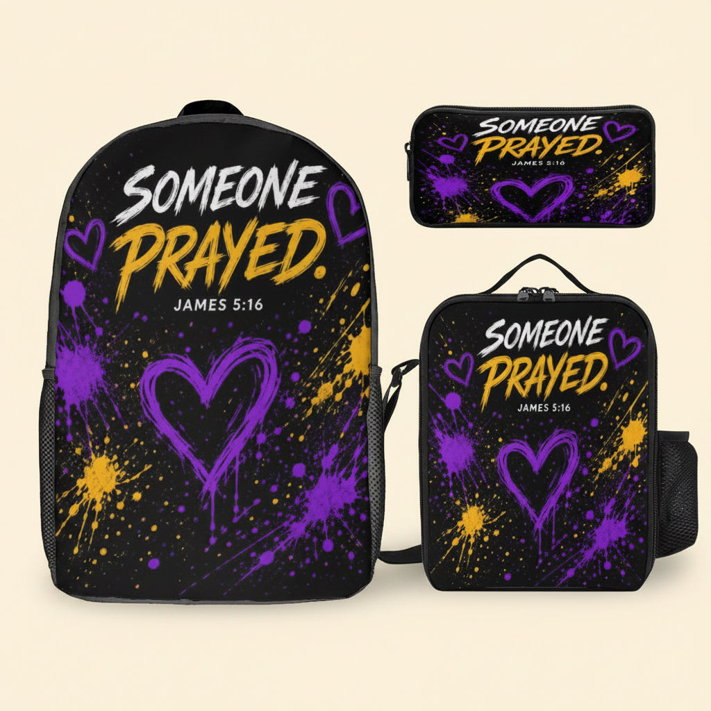 A black backpack shown with two smaller matching pouches on a plain white background. The backpack and pouches feature the phrase “SOMEONE PRAYED.