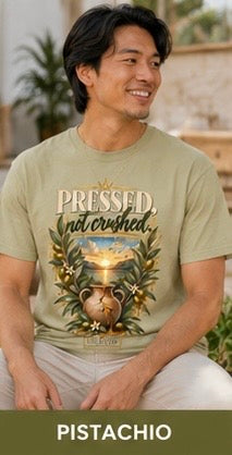 Pistachio green pressed graphic tee with large front illustration and slogan