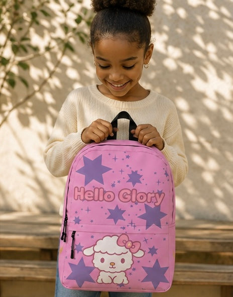 Kids backpack worn by child, purple with stars, Hello Glory text, and cartoon lamb