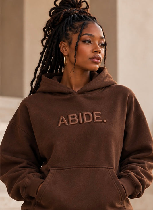 Brown ABIDE hoodie with hood, back logo, and kangaroo pocket