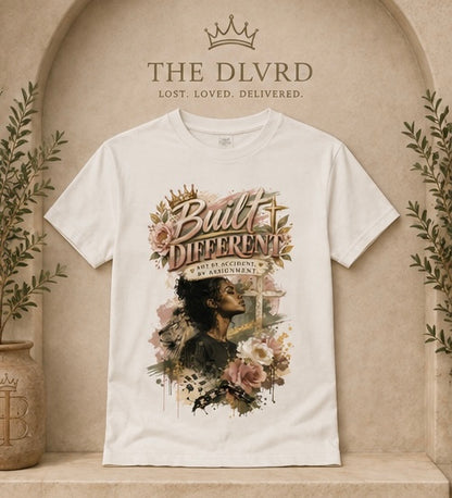 White women’s graphic t-shirt with gold and floral portrait artwork