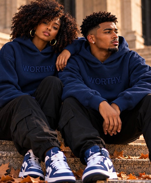 Classic navy pullover hoodie with WORTHY logo on chest and ribbed cuffs