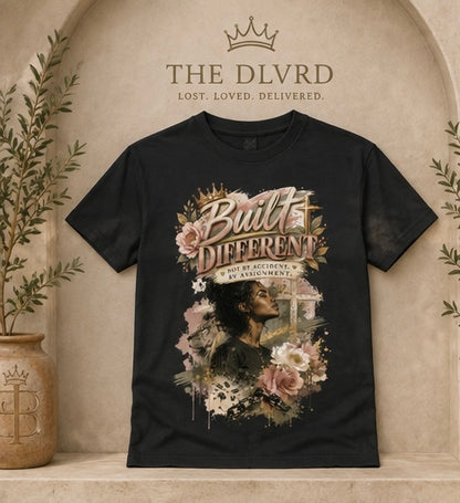 Black women’s graphic t-shirt with gold and floral portrait artwork