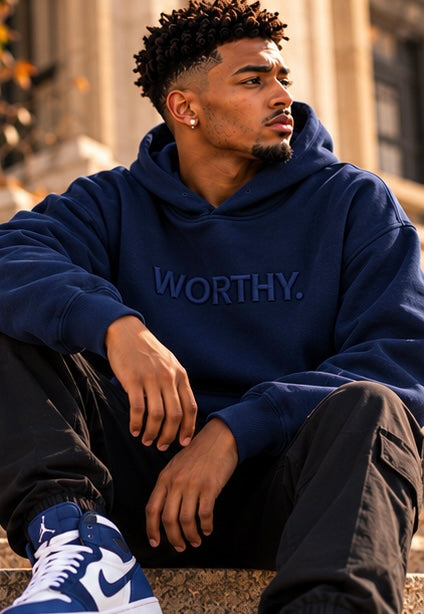 Classic navy pullover hoodie with WORTHY logo on chest and drawstring hood