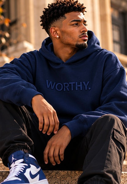 Classic navy pullover hoodie with WORTHY logo on chest and drawstring hood