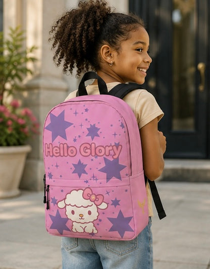Kids backpack worn by child, purple front with Hello Glory text and cartoon lamb