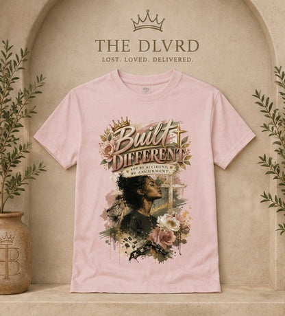 Light pink women’s graphic t-shirt with gold and floral portrait artwork