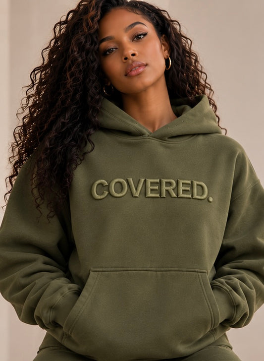 Army green hoodie with COVERED. logo, front pocket and drawstring hood