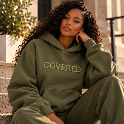 Army green hoodie with COVERED. logo, front kangaroo pocket and drawstring hood