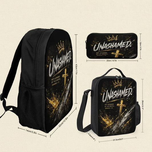 Black backpack, pencil case, and lunch bag set with a gold and white 'UNASHAMED' graphic featuring a crown and cross, shown with dimension lines on a white background.