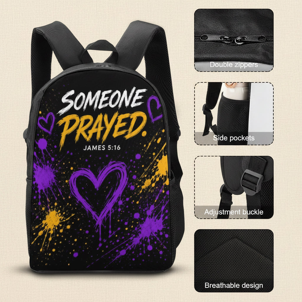 Black backpack with a purple and yellow paint splatter design, featuring the text 'SOMEONE PRAYED. JAMES 5:16' and a large heart graphic.