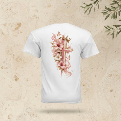 White short-sleeve t-shirt shown from the back, featuring a large graphic print of a pink cross decorated with pink lilies, gold leaves, and butterflies.